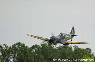 The 1/4 scale Spitfire on a zoom and boom pass.